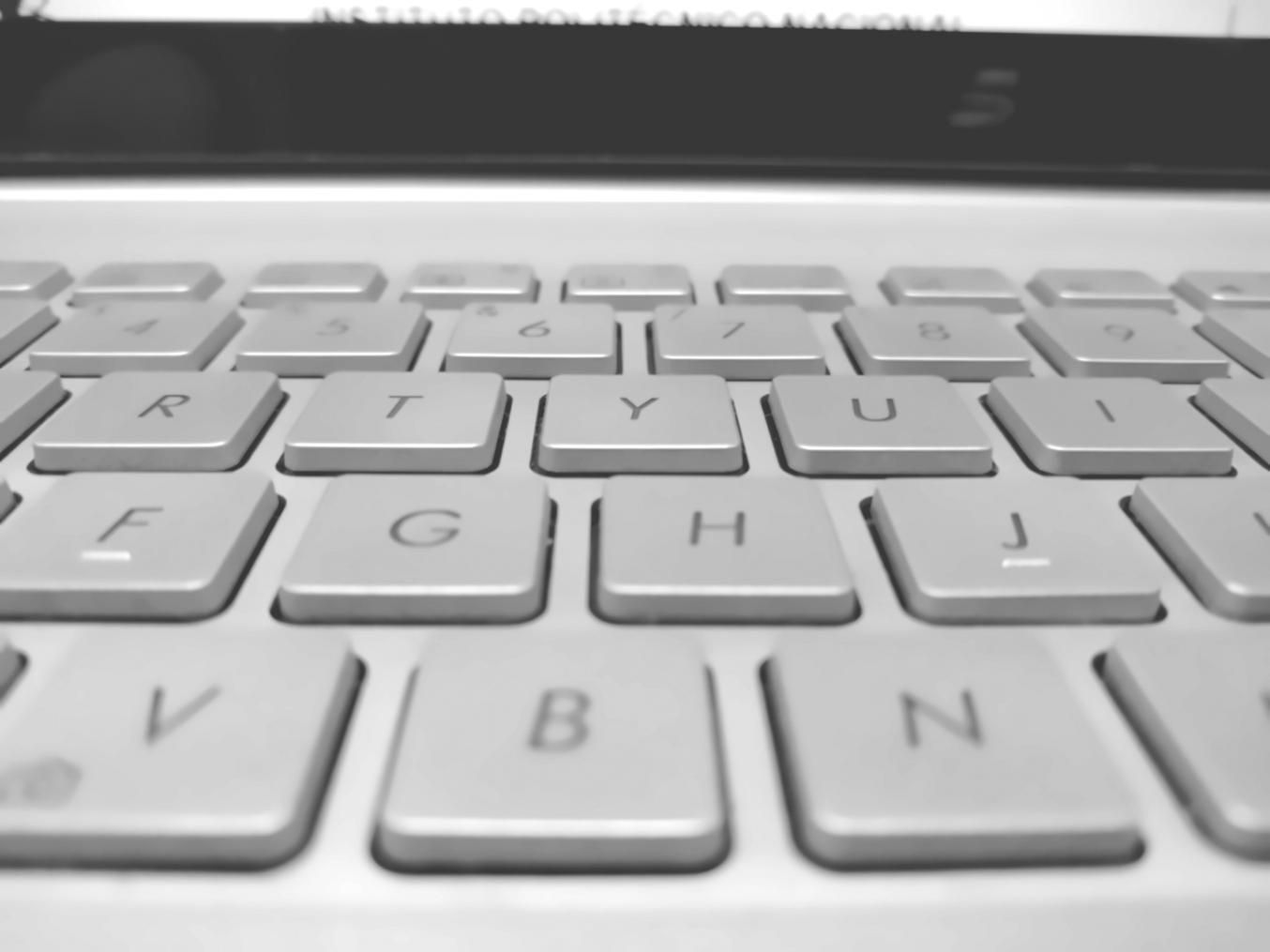 Students working collaboratively on game development projects in a modern learning environment